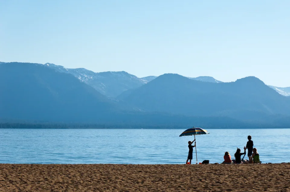 Editorial lifestyle photograph for preparing for a family beach day.